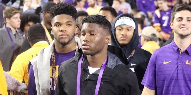 LSU rolls out the red carpet for Cain LSU rolls out the red carpet for Cain