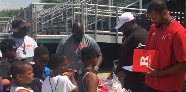 Rutgers football staff giving back to the community Rutgers football staff giving back to the community