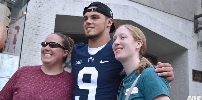 Penn State football players tackle Arts Fest crowd Penn State football players tackle Arts Fest crowd